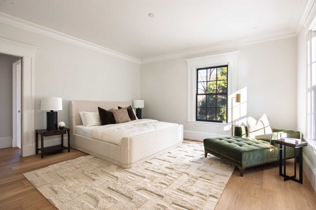 172 Brattle Street Cambridge, MA 02138 - Photo 22 of 42 a bedroom with a bed a couch and a window