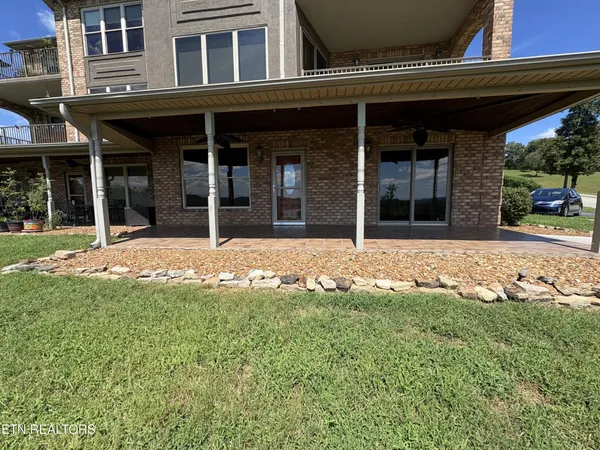 a view of a building with a garden