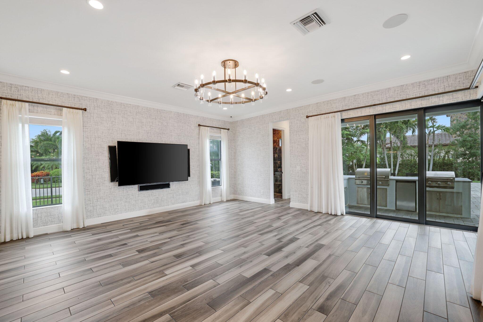 2585 Northwest 69th Street Boca Raton, FL 33496 - Photo 27 of 84 family room