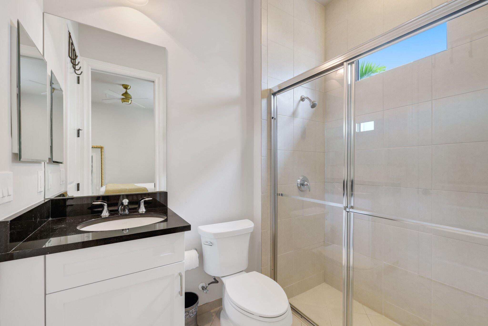 2585 Northwest 69th Street Boca Raton, FL 33496 - Photo 32 of 84 bathroom 1 down