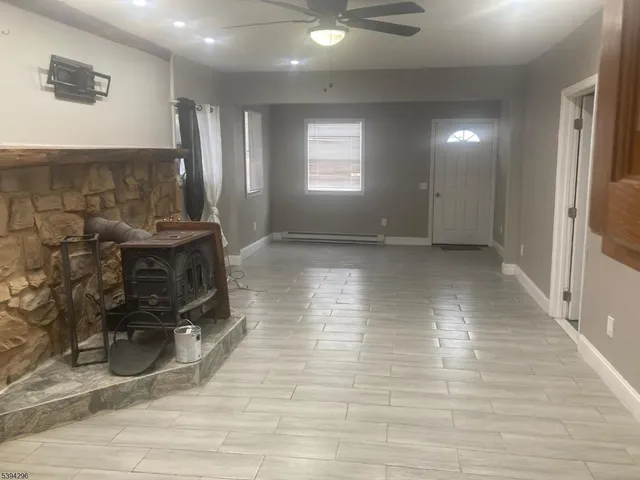 a view of a livingroom with a fireplace