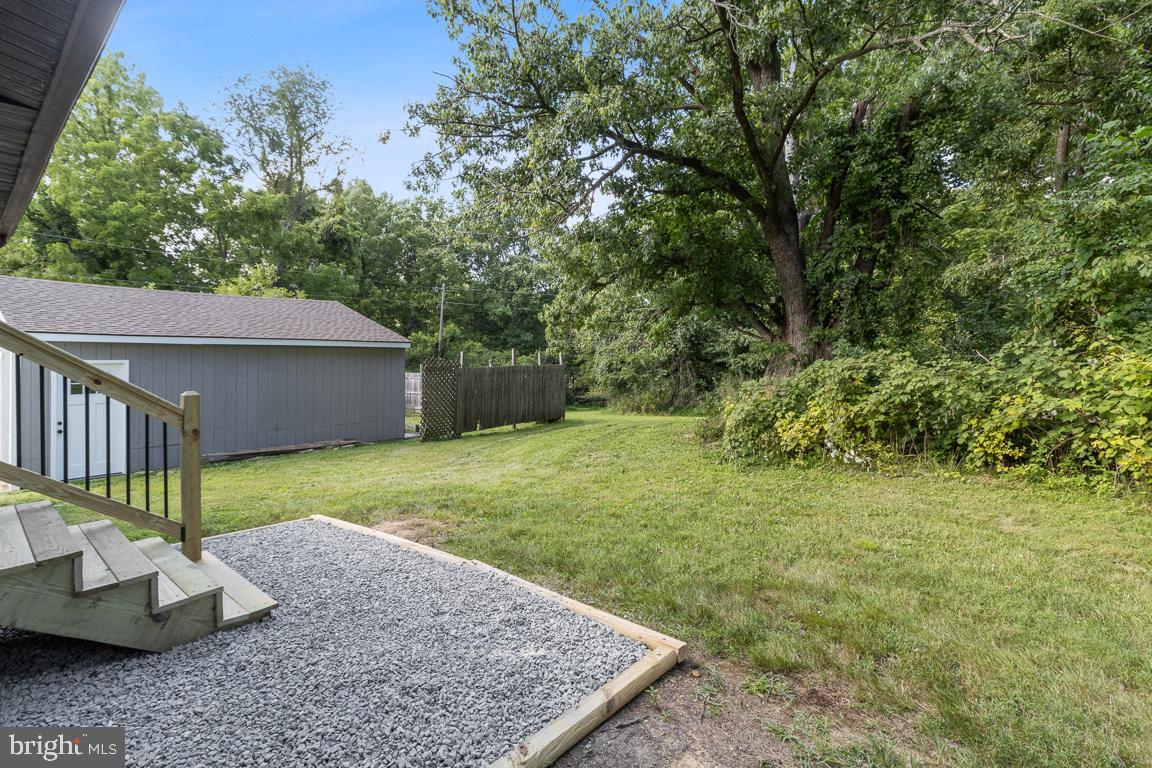2300 Liberty Road Sykesville, MD 21784 - Photo 23 of 25 a view of a backyard with large trees