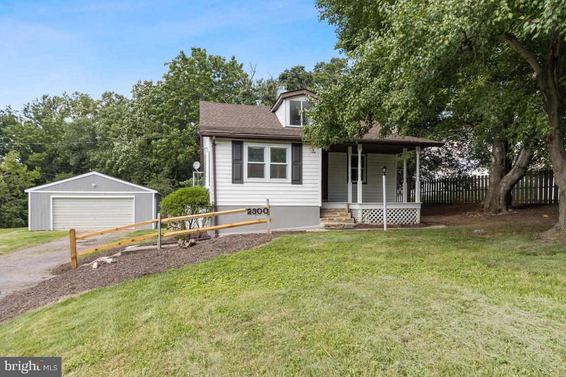 2300 Liberty Road Sykesville, MD 21784 - Photo 3 of 25 a front view of a house with a yard