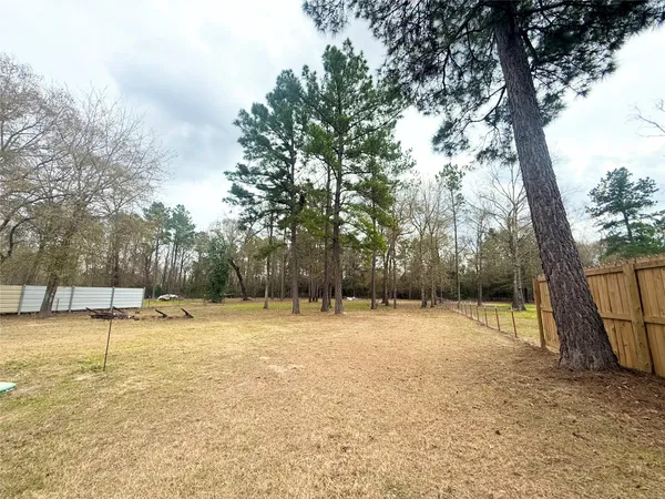 a view of a deck with a fence