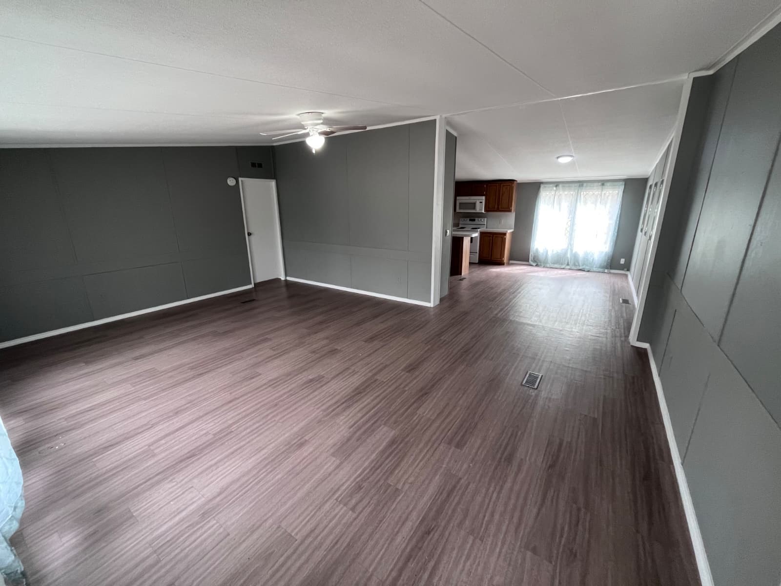 14912 Hannah Way Conroe, TX 77302 - Photo 13 of 20 a view of empty room with wooden floor