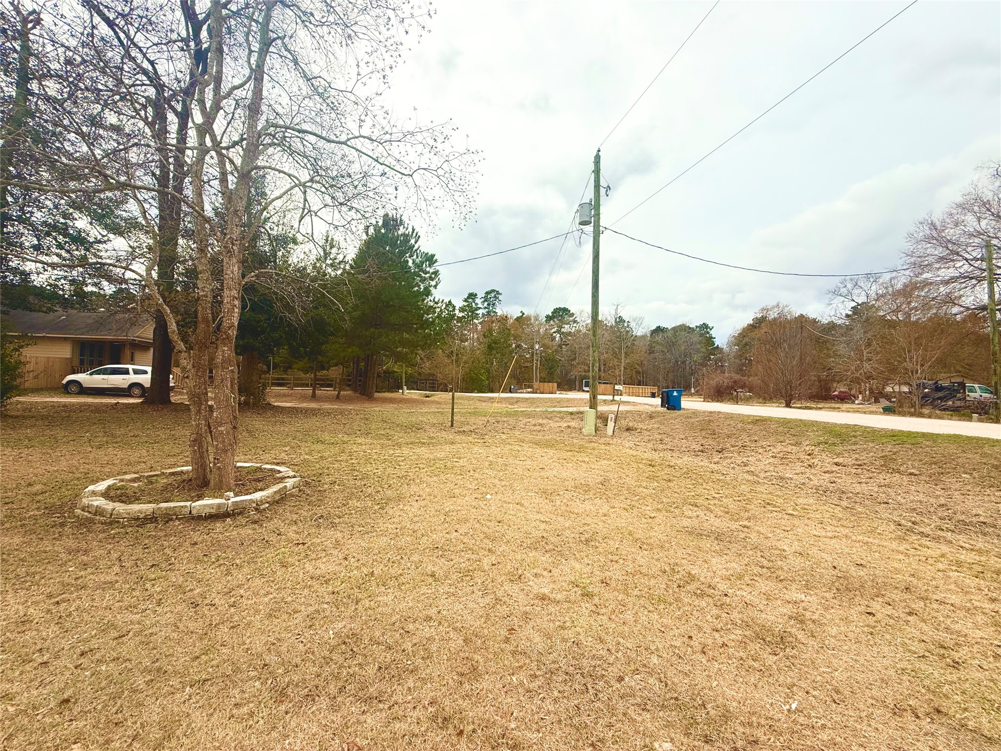14912 Hannah Way Conroe, TX 77302 - Photo 3 of 20 a view of a lake with a house