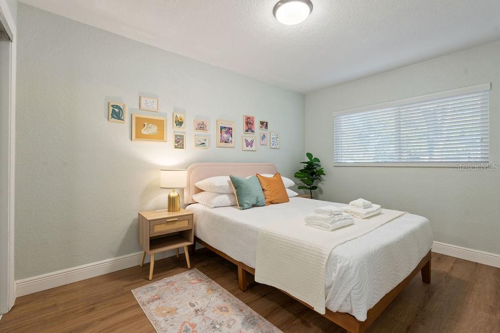 11987 Maple Street Dunnellon, FL 34432 - Photo 44 of 72 a bedroom with a bed and a window