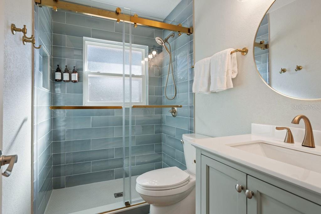 11987 Maple Street Dunnellon, FL 34432 - Photo 48 of 72 a bathroom with a sink toilet and shower