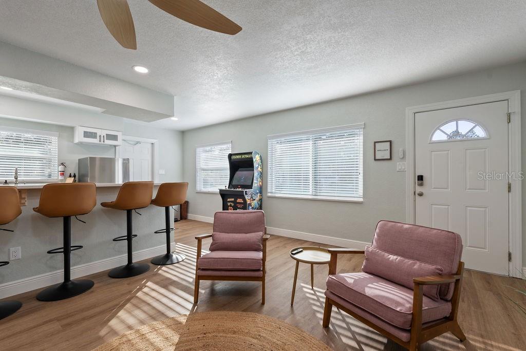 11987 Maple Street Dunnellon, FL 34432 - Photo 55 of 72 a living room with furniture and a window