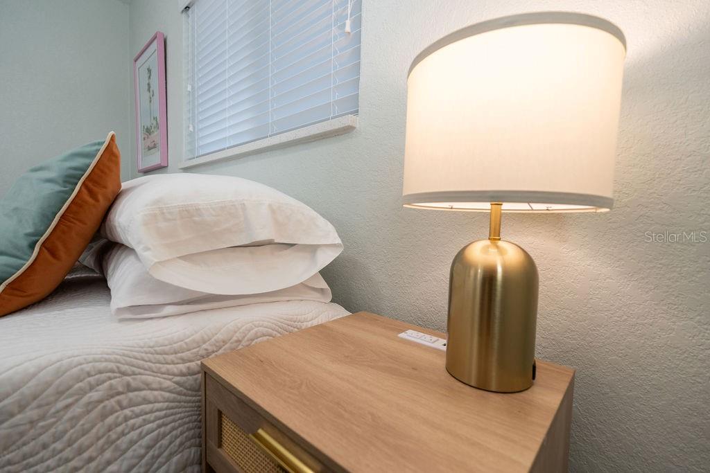 11987 Maple Street Dunnellon, FL 34432 - Photo 64 of 72 a bedroom with a bed and a dresser