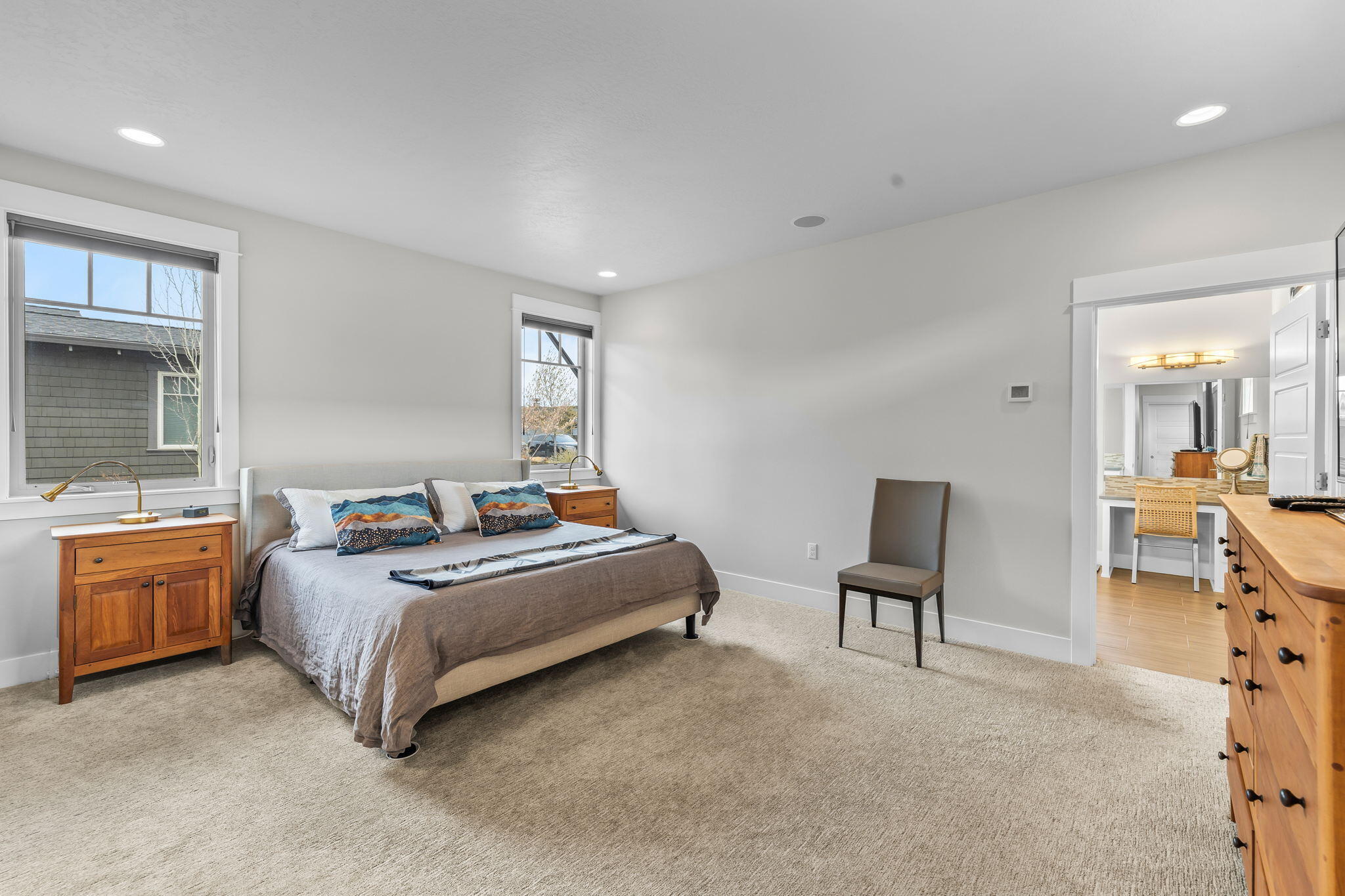 19313 Alianna Loop Bend, OR 97702 - Photo 10 of 29 Serene primary suite is located in separate wing of home from the two full en-suite guest bedrooms.