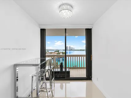 a view of balcony with furniture