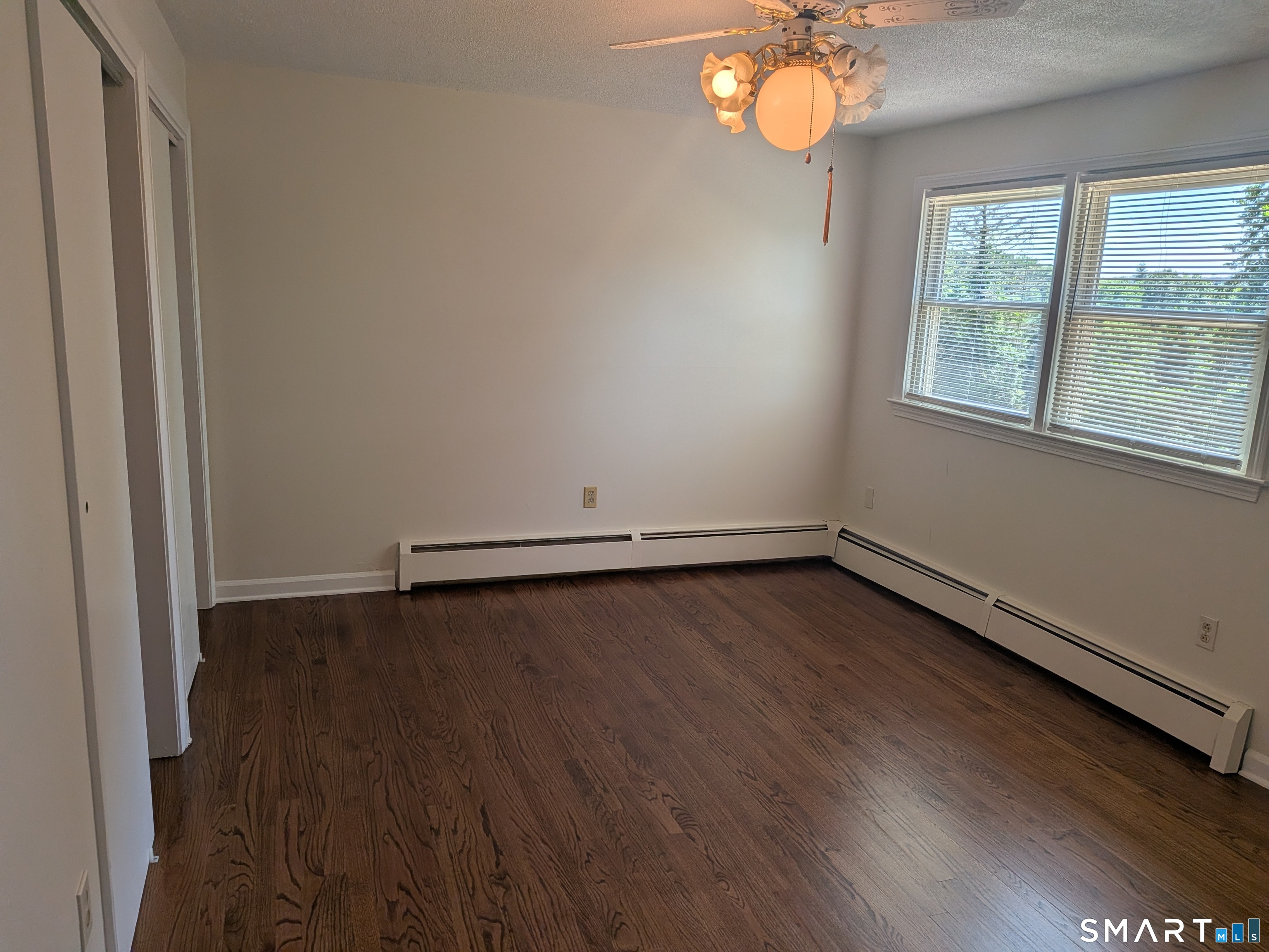 124 Spring Lake Road Waterbury, CT 06706 - Photo 11 of 34 Primary bedroom looking on from entrance doorway.