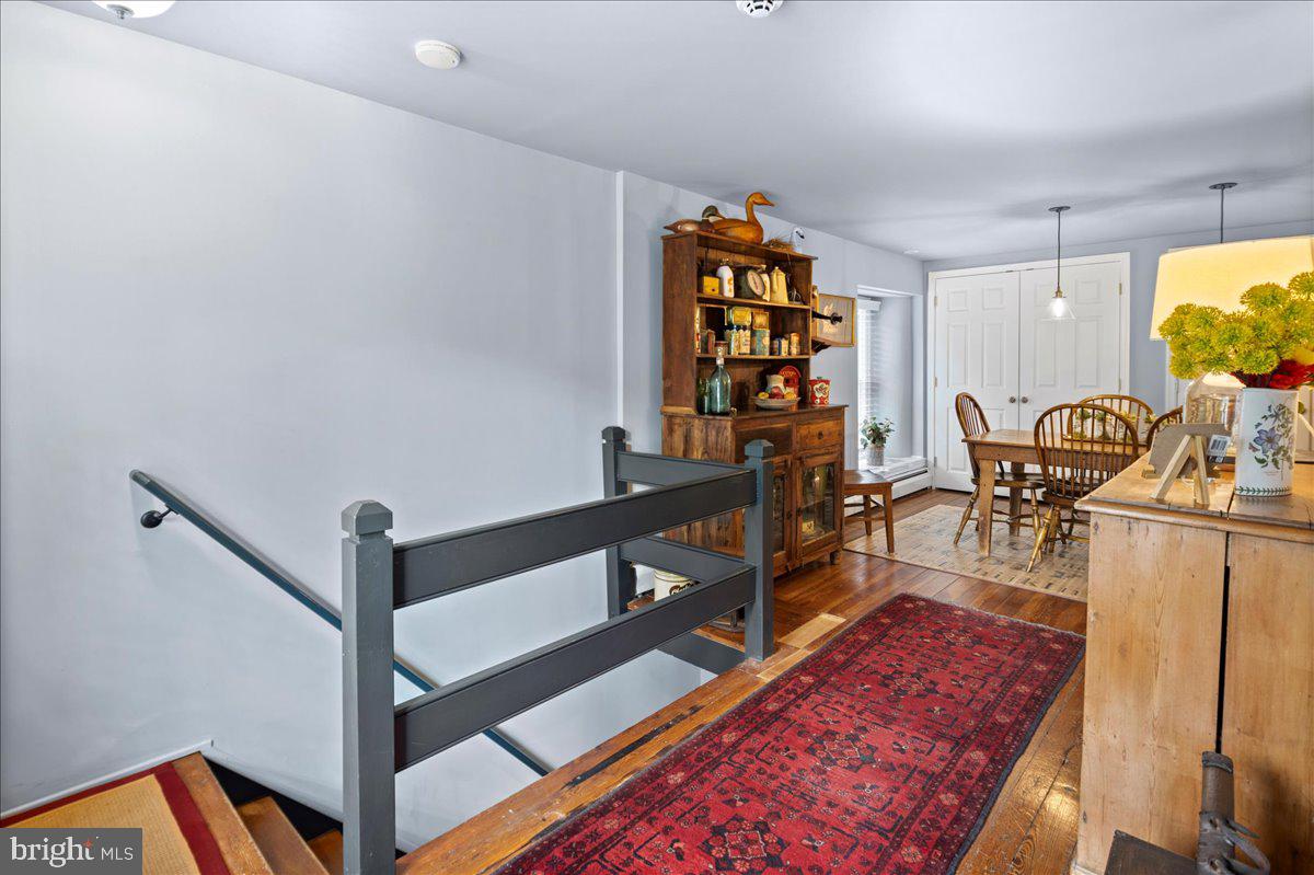 2996 Sugan Road New Hope, PA 18938 - Photo 54 of 72 a living room with furniture and a wooden floor