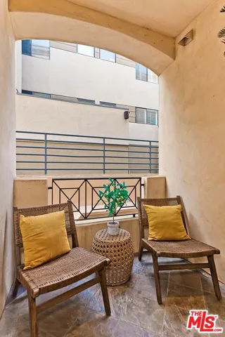 a building outdoor space with patio furniture