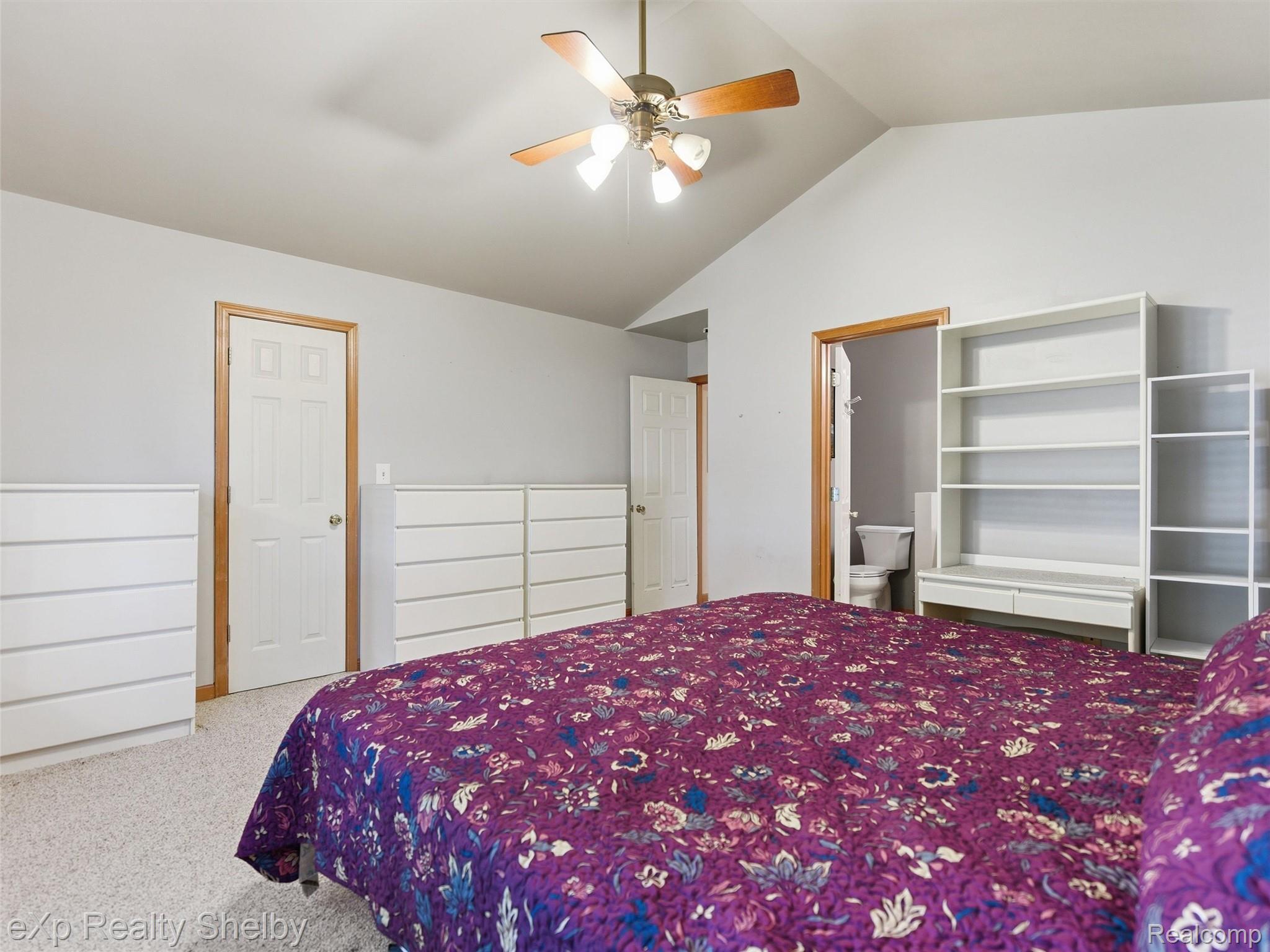 4154 Union Street Dryden, MI 48428 - Photo 20 of 41 Bedroom with vaulted ceiling and ceiling fan