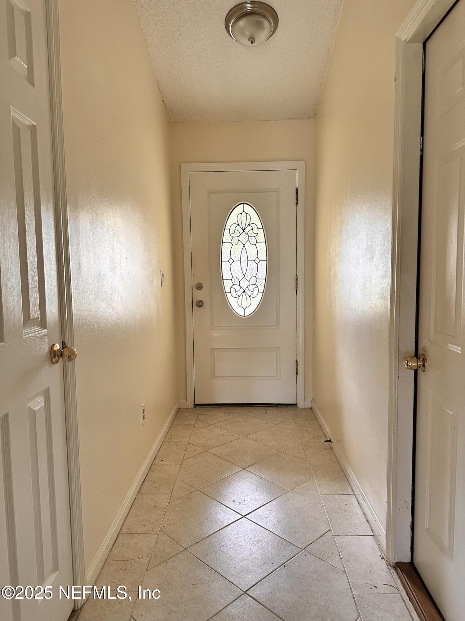 83041 St Mark Drive Yulee, FL 32097 - Photo 2 of 28 a view of a hallway with elevator