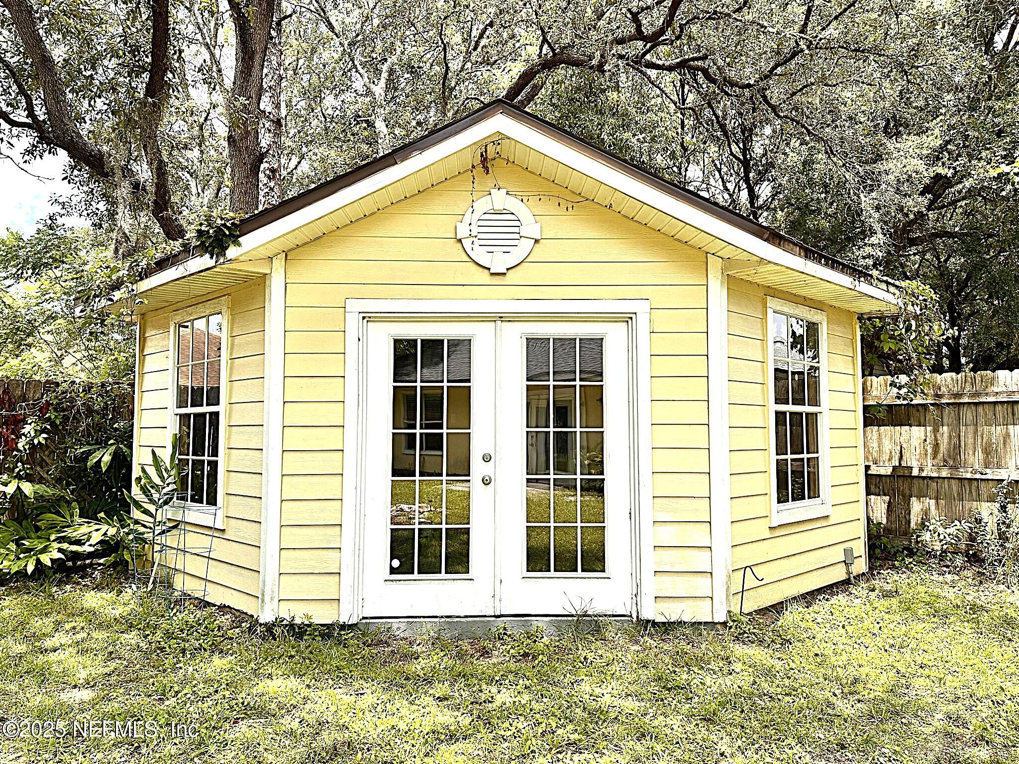83041 St Mark Drive Yulee, FL 32097 - Photo 23 of 28 a view of a house with a yard
