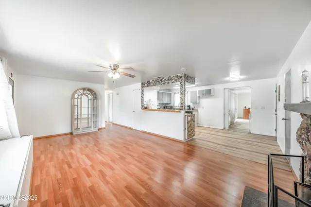 a view of a kitchen with wooden floor