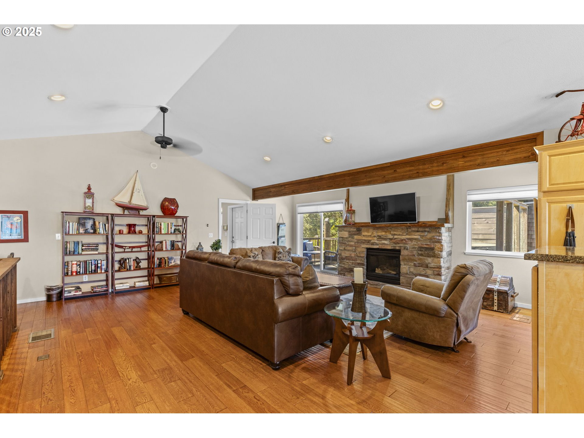 238 Southwest 27th Street Newport, OR 97366 - Photo 11 of 34 a living room with furniture and a flat screen tv