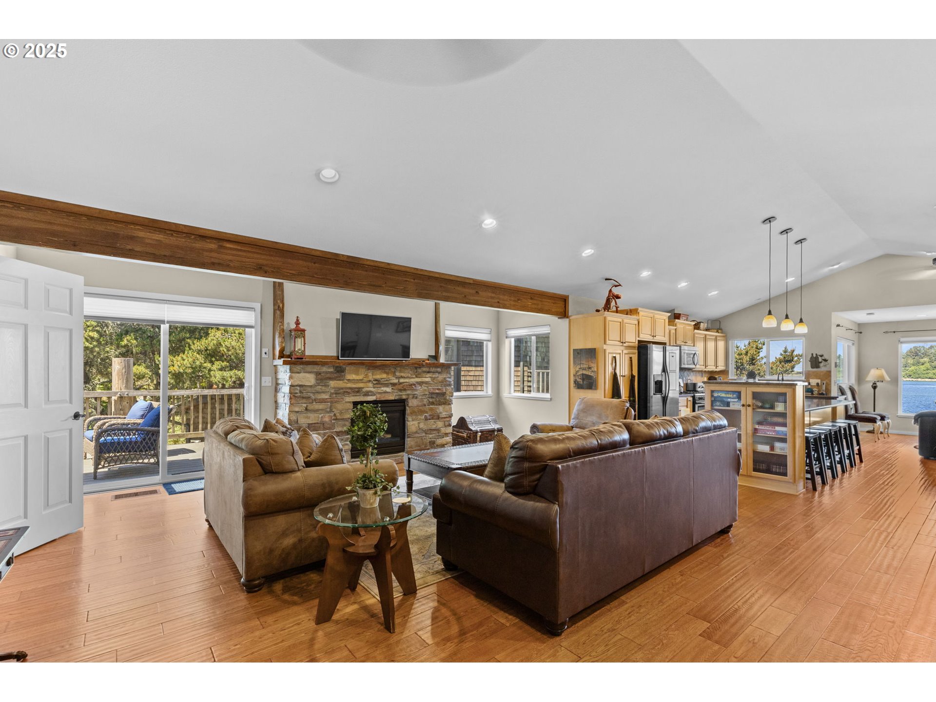 238 Southwest 27th Street Newport, OR 97366 - Photo 13 of 34 a living room with furniture and a fireplace