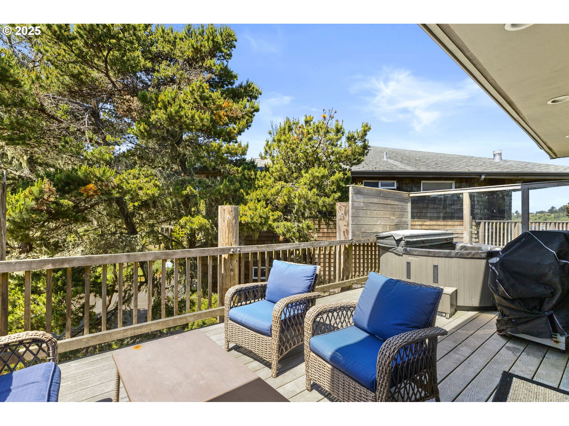 238 Southwest 27th Street Newport, OR 97366 - Photo 15 of 34 a balcony with wooden floor and furniture