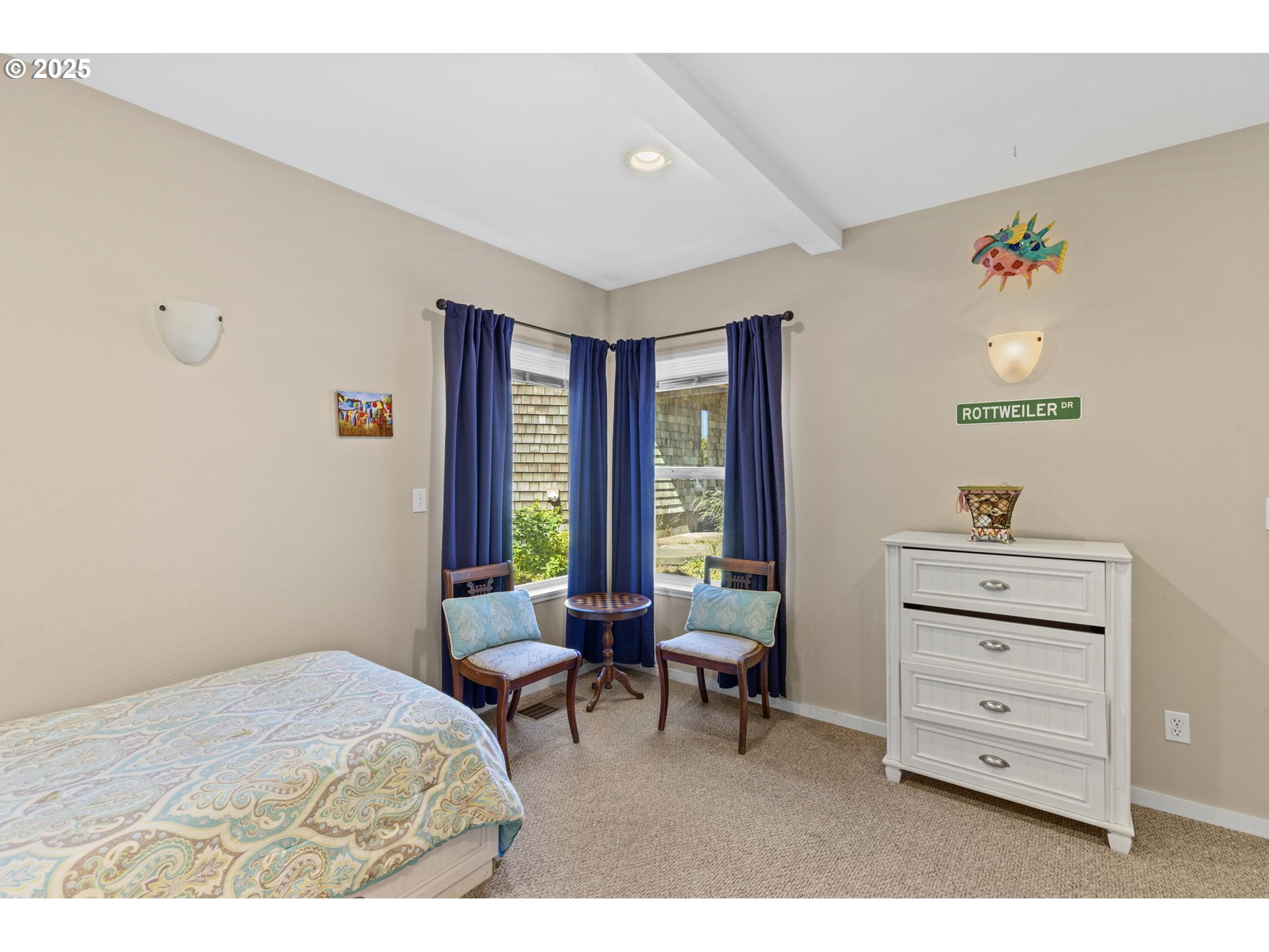 238 Southwest 27th Street Newport, OR 97366 - Photo 24 of 34 a bedroom with furniture and a window
