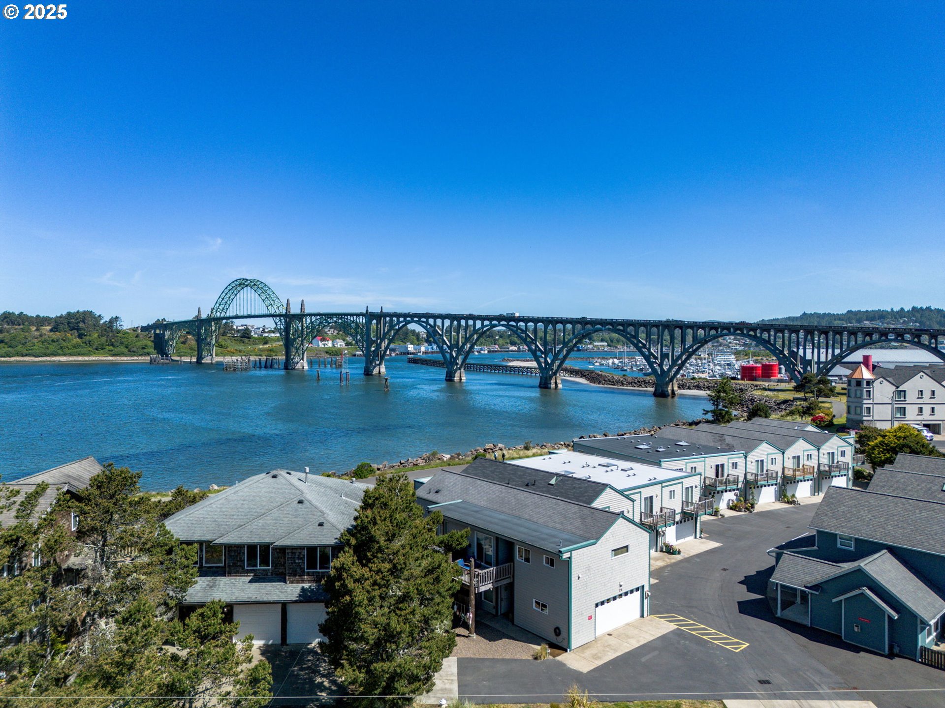 238 Southwest 27th Street Newport, OR 97366 - Photo 3 of 34 a view of a lake with couches and city view