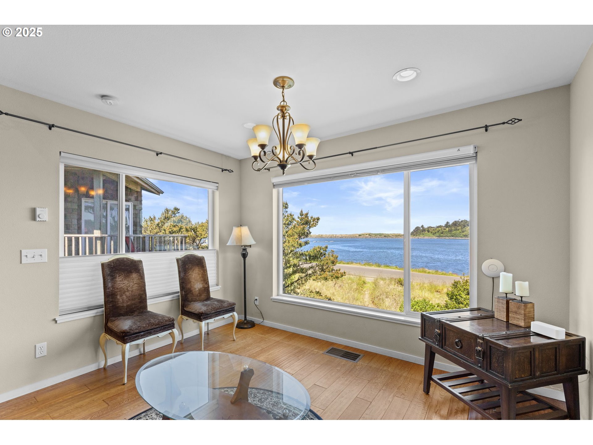 238 Southwest 27th Street Newport, OR 97366 - Photo 5 of 34 a work room with furniture and a window