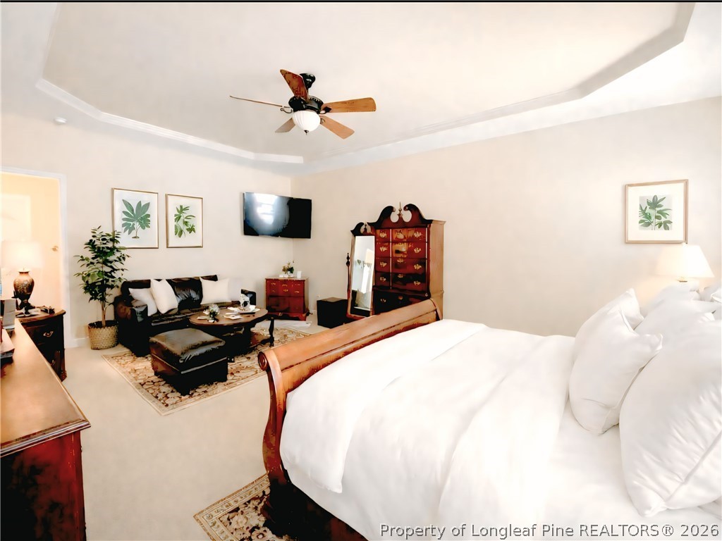 5236 Spreading Branch Road Hope Mills, NC 28348 - Photo 6 of 14 a bedroom with a bed and wooden floor