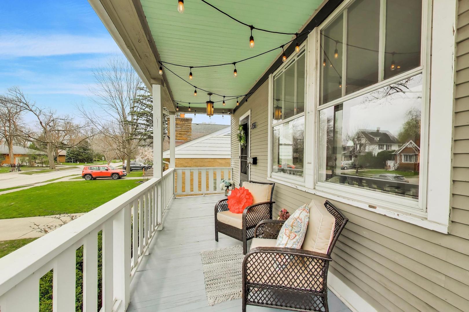256 Blackhawk Road Riverside, IL 60546 - Photo 4 of 73 a sitting area with furniture and wooden deck