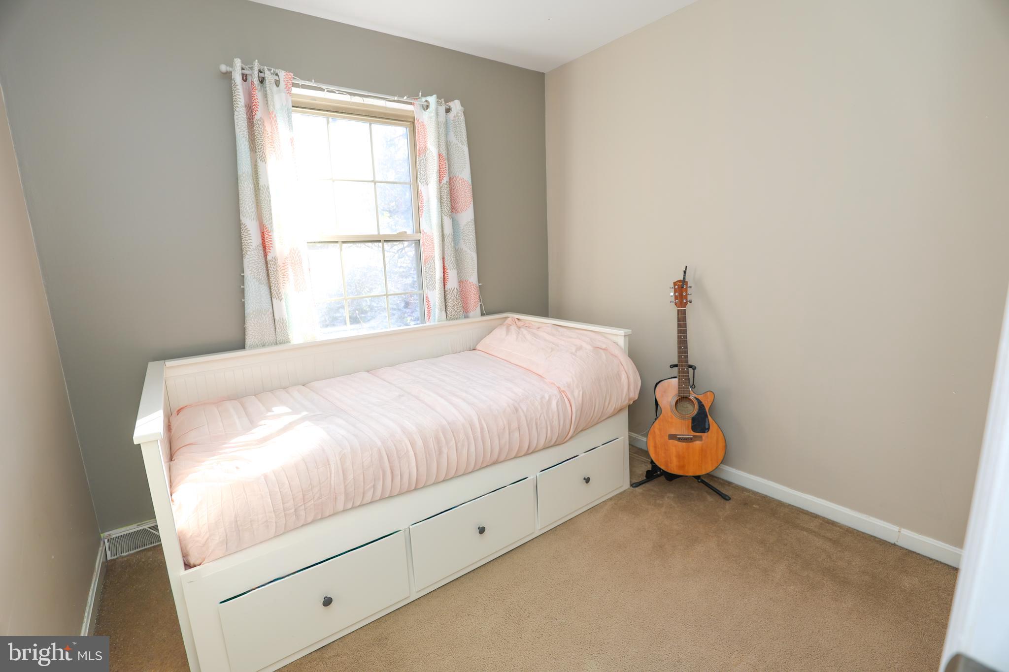 407 Crosswinds Drive Lititz, PA 17543 - Photo 11 of 18 a bedroom with a bed and a window