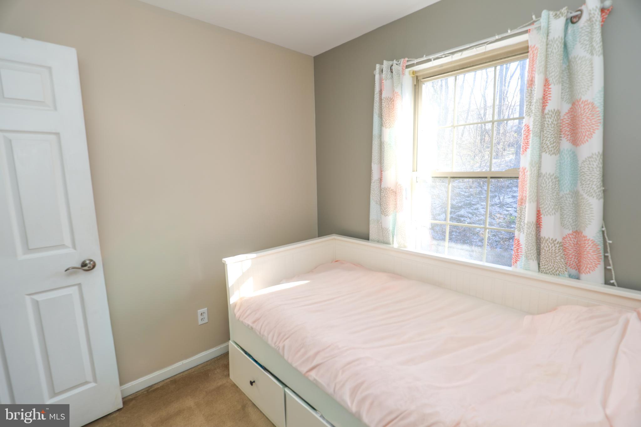 407 Crosswinds Drive Lititz, PA 17543 - Photo 12 of 18 a bedroom with a bed and a window
