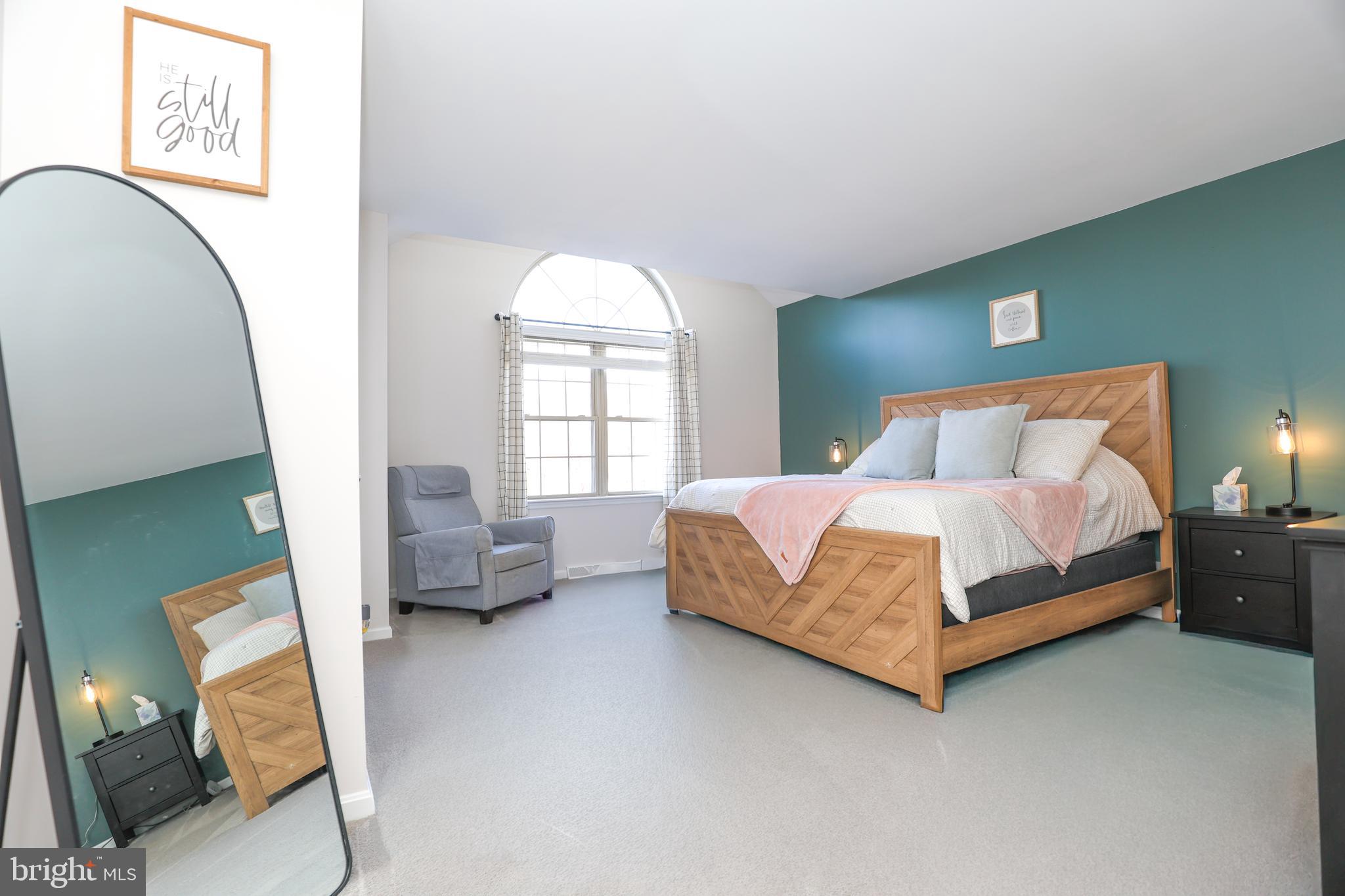 407 Crosswinds Drive Lititz, PA 17543 - Photo 13 of 18 a bedroom with a bed and a large window