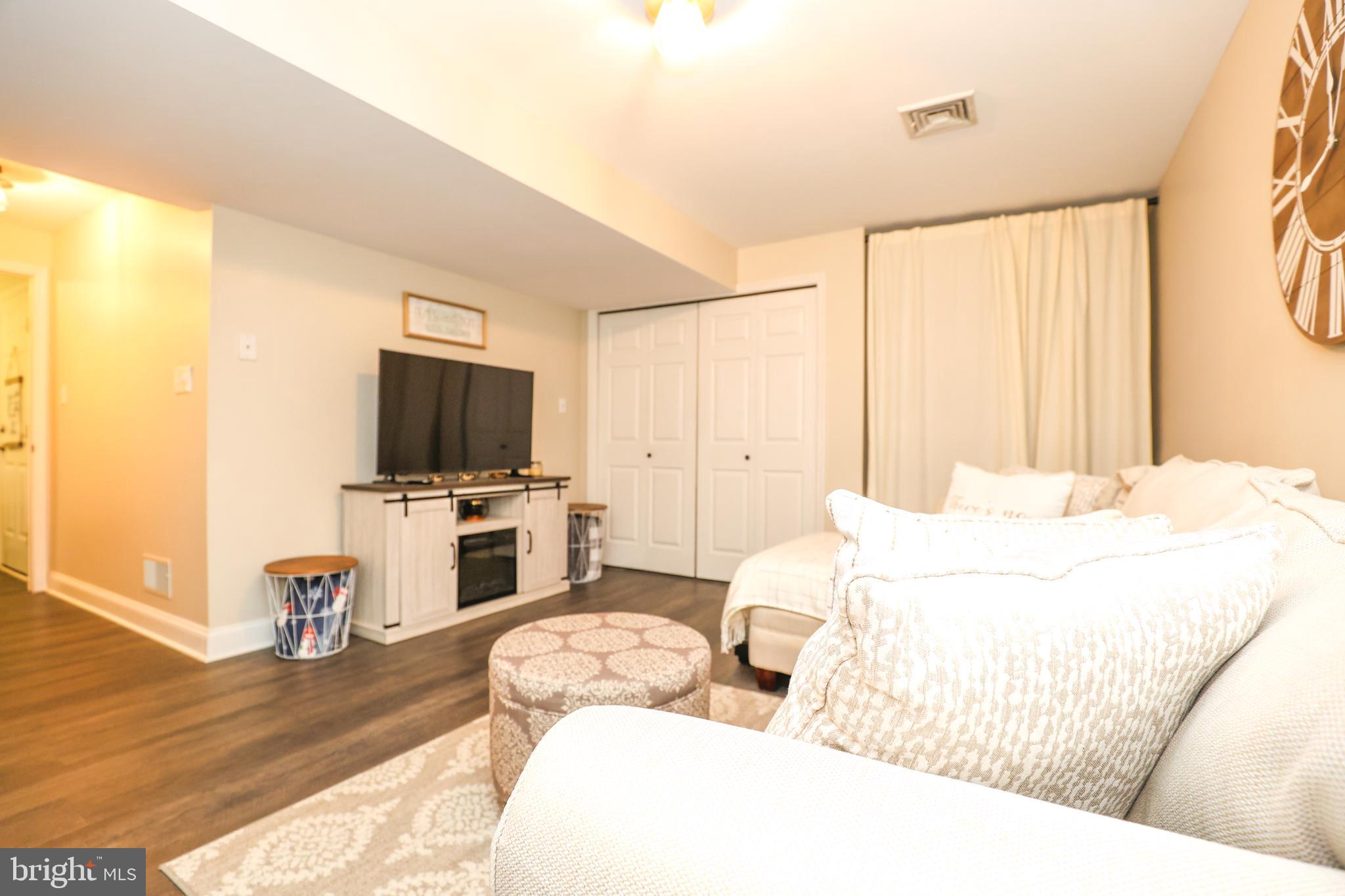 407 Crosswinds Drive Lititz, PA 17543 - Photo 15 of 18 a living room with furniture and a flat screen tv