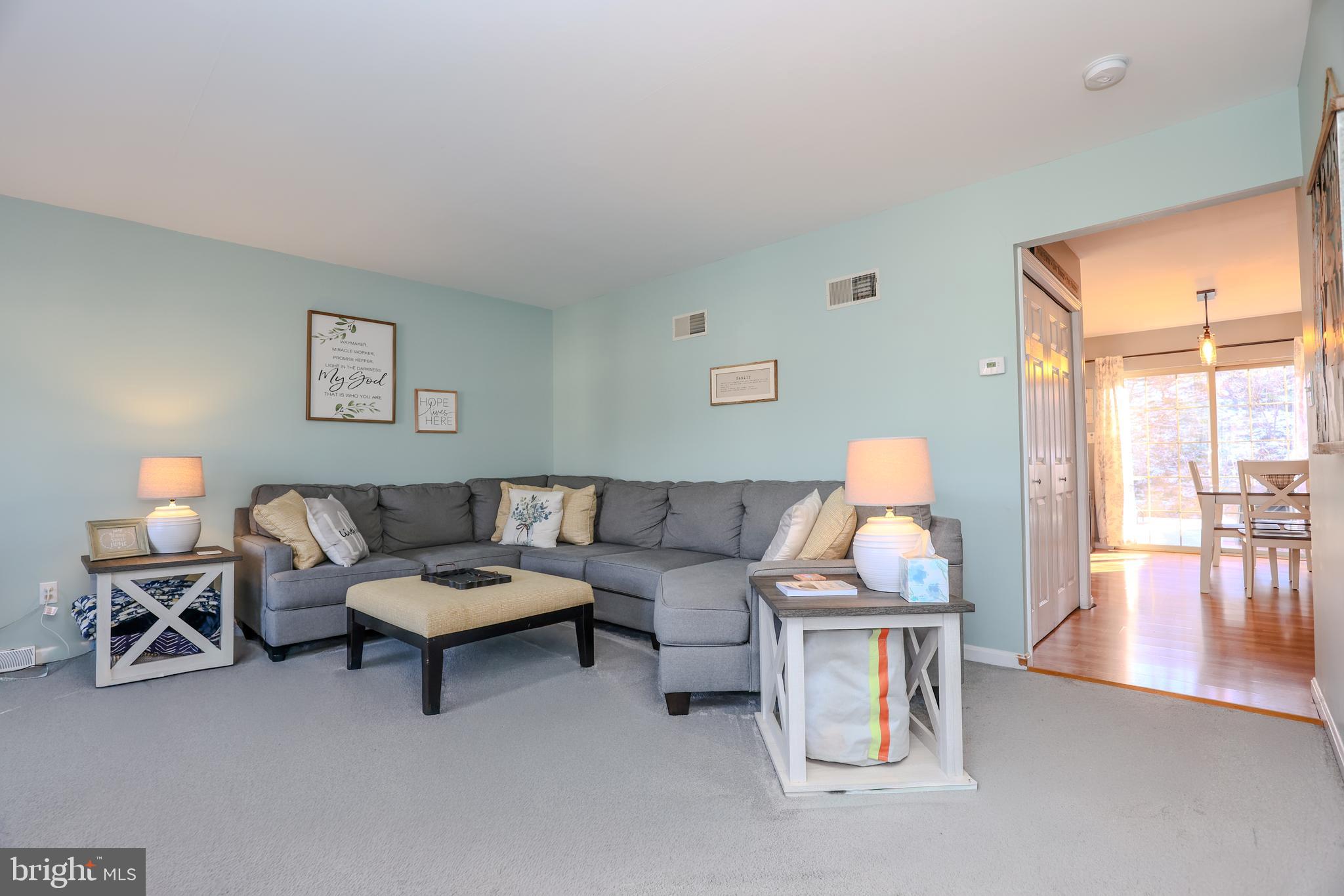 407 Crosswinds Drive Lititz, PA 17543 - Photo 8 of 18 a living room with furniture and wooden floor