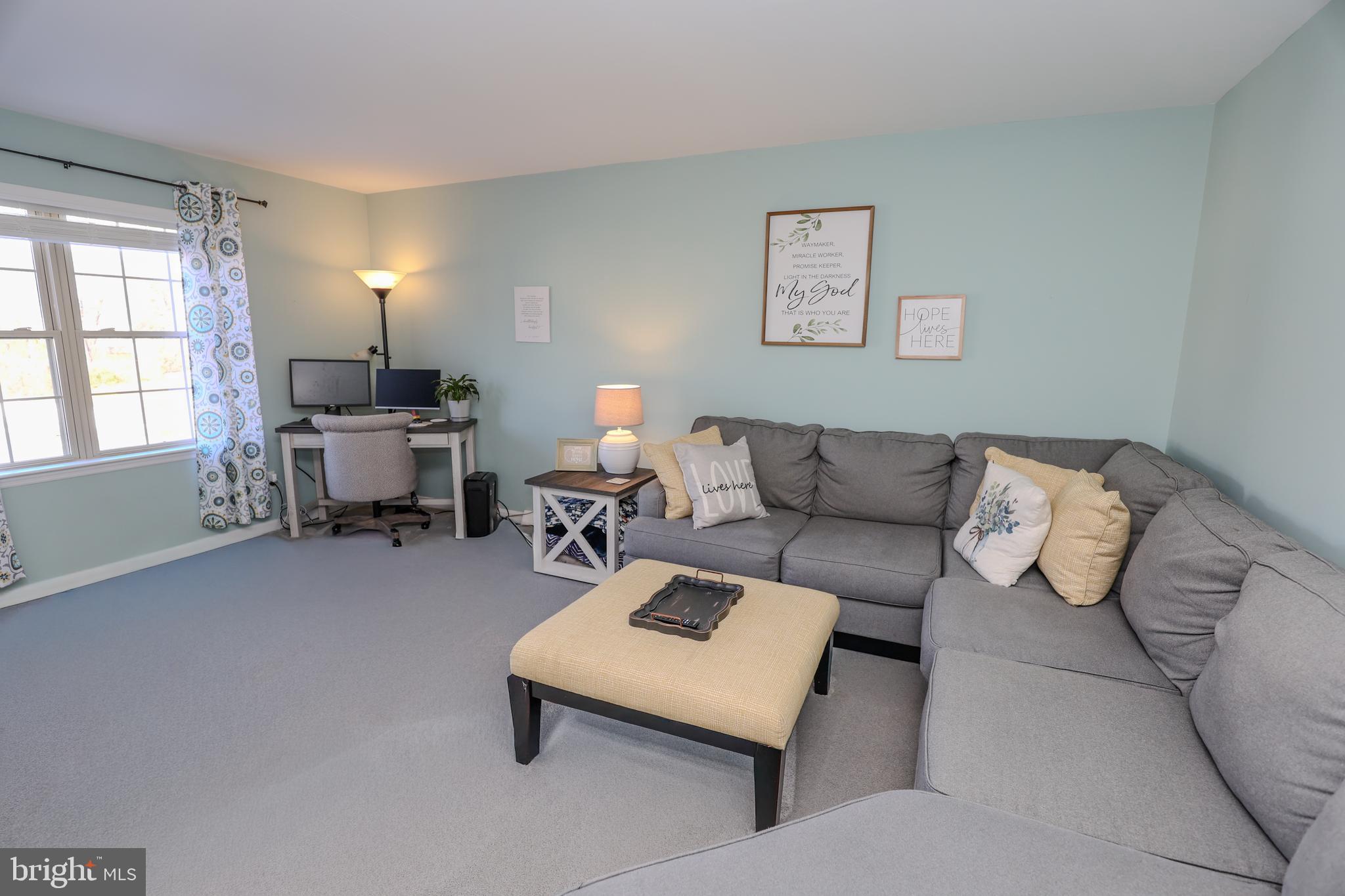 407 Crosswinds Drive Lititz, PA 17543 - Photo 9 of 18 a living room with furniture and a table