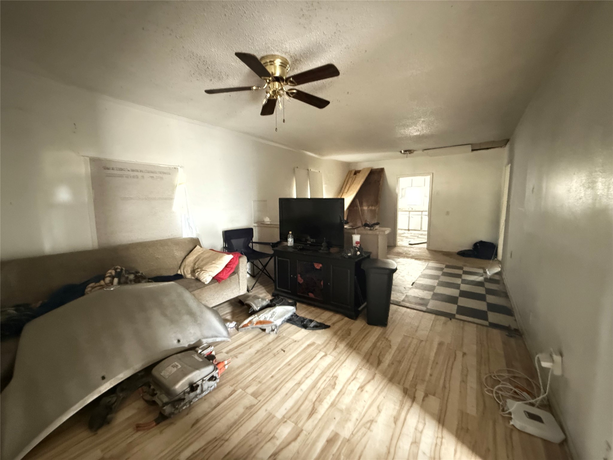 2478 Druid Street Houston, TX 77091 - Photo 16 of 29 a bedroom with a bed and a chandelier