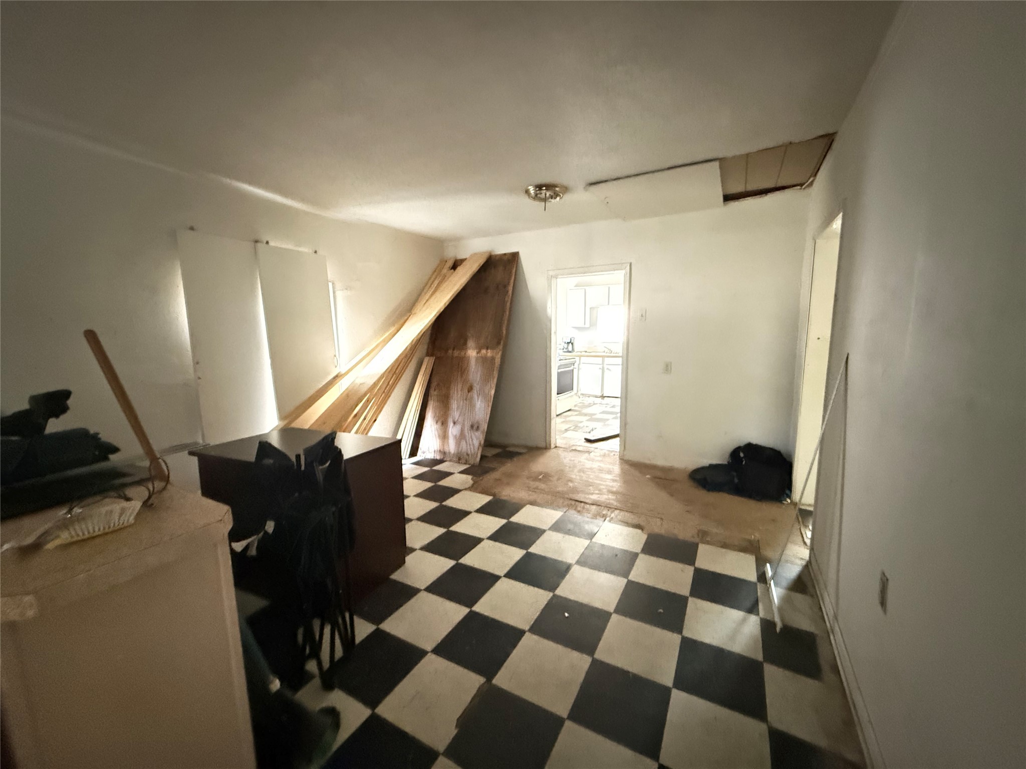2478 Druid Street Houston, TX 77091 - Photo 17 of 29 a view of a livingroom with wooden floor and furniture