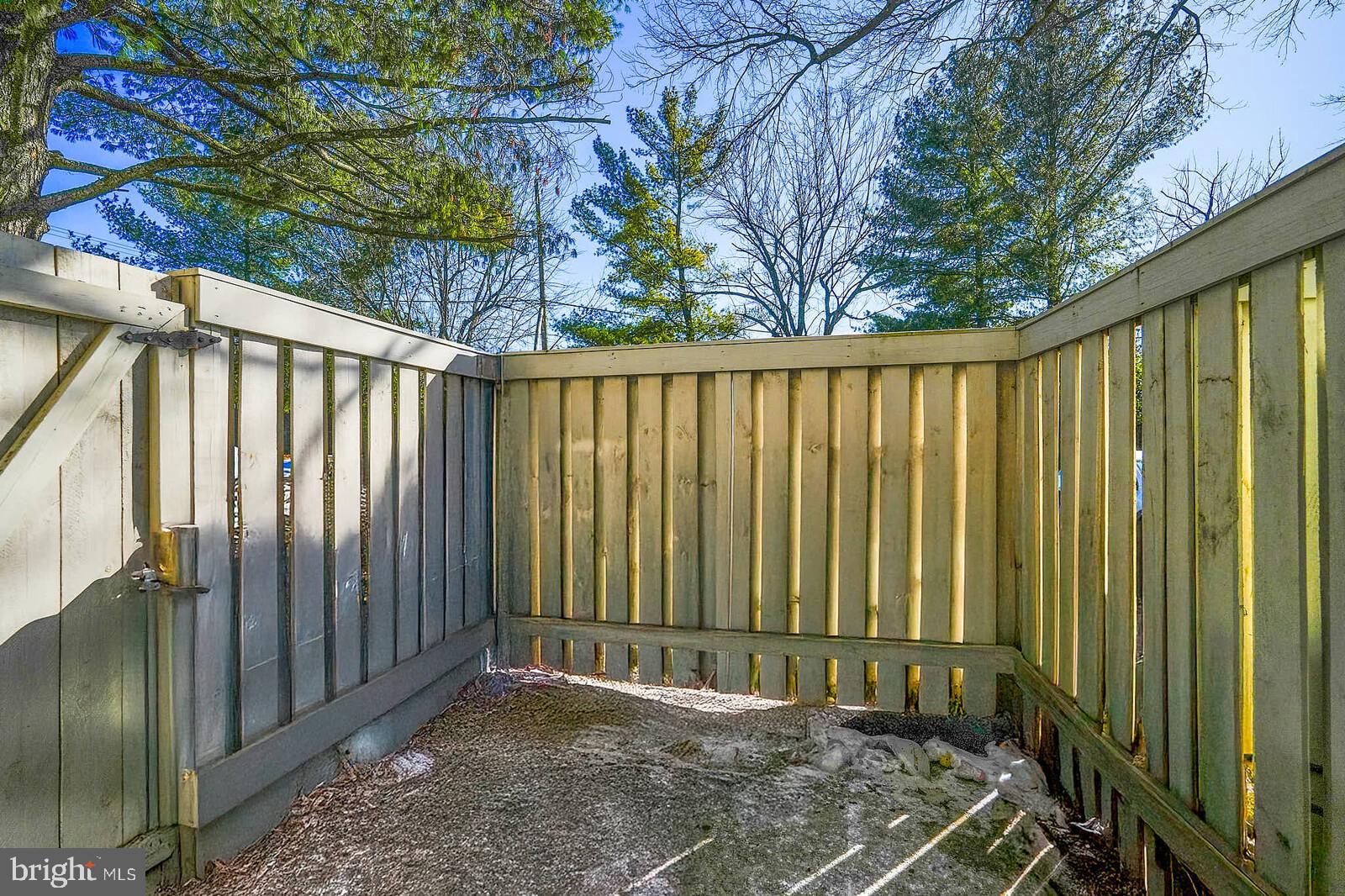 7900 Bentley Village Drive, Unit 11B Springfield, VA 22152 - Photo 19 of 42 Fenced front yard.