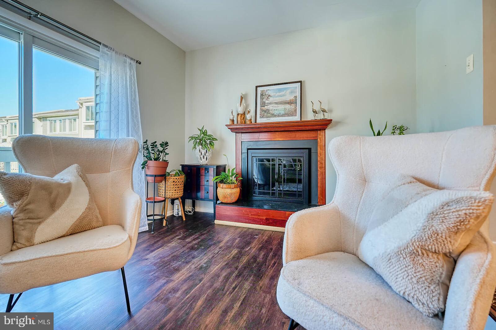 7900 Bentley Village Drive, Unit 11B Springfield, VA 22152 - Photo 7 of 42 Living room fireplace.