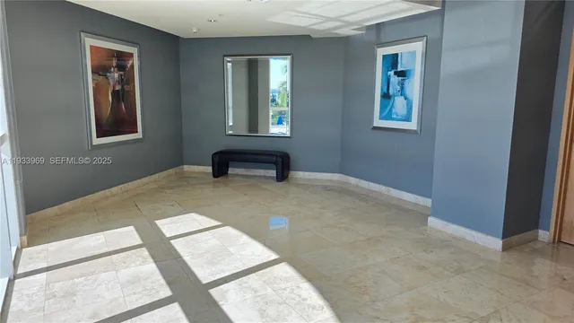 a view of a city with tall buildings and a big yard