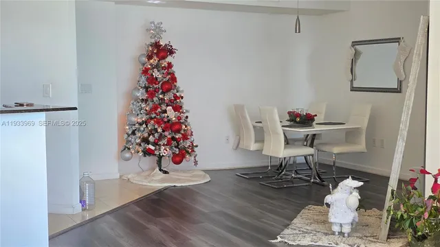 a bedroom with a bed and a television