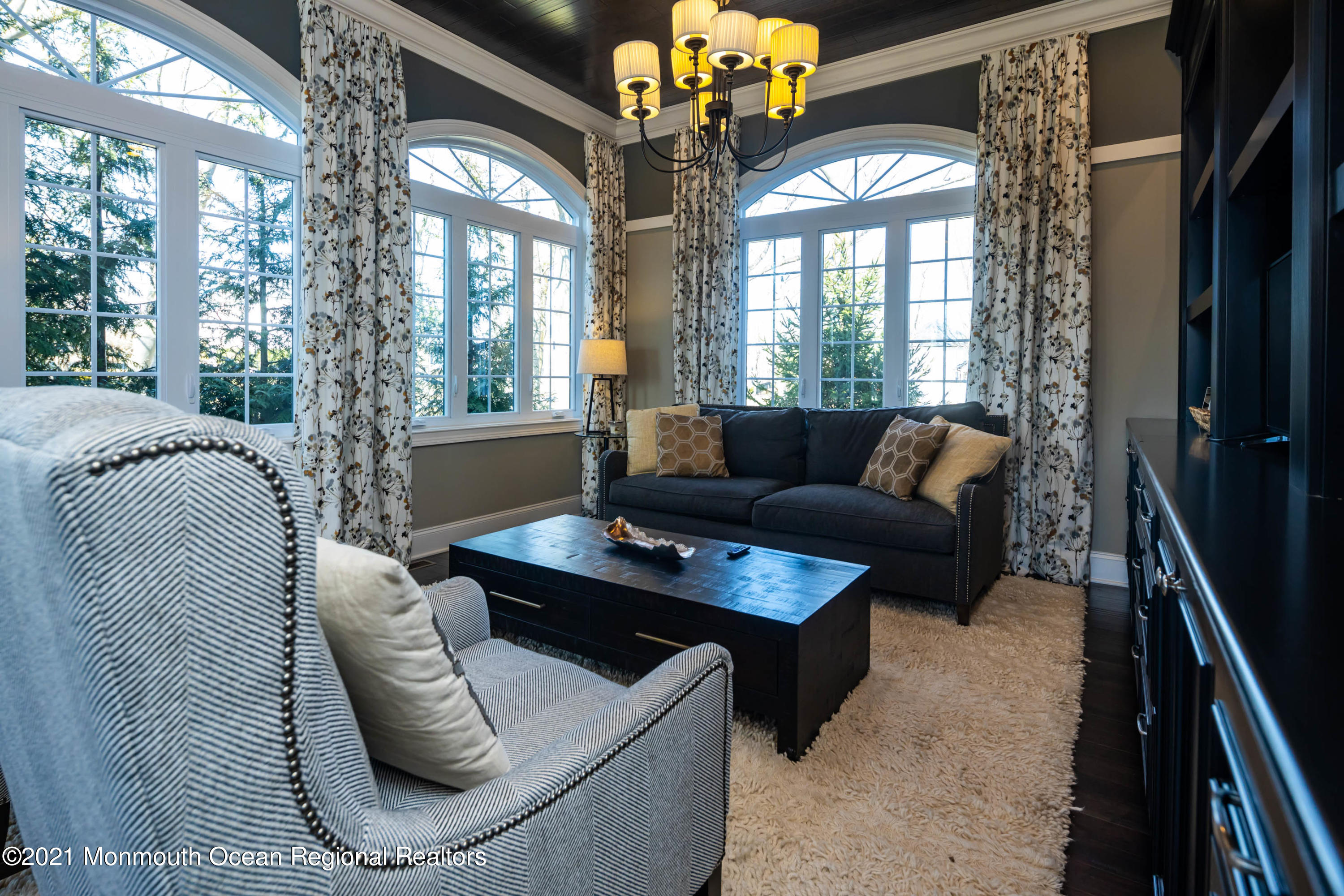 8 Strathmore Road Lincroft, NJ 07738 - Photo 17 of 76 a living room with furniture and a large window