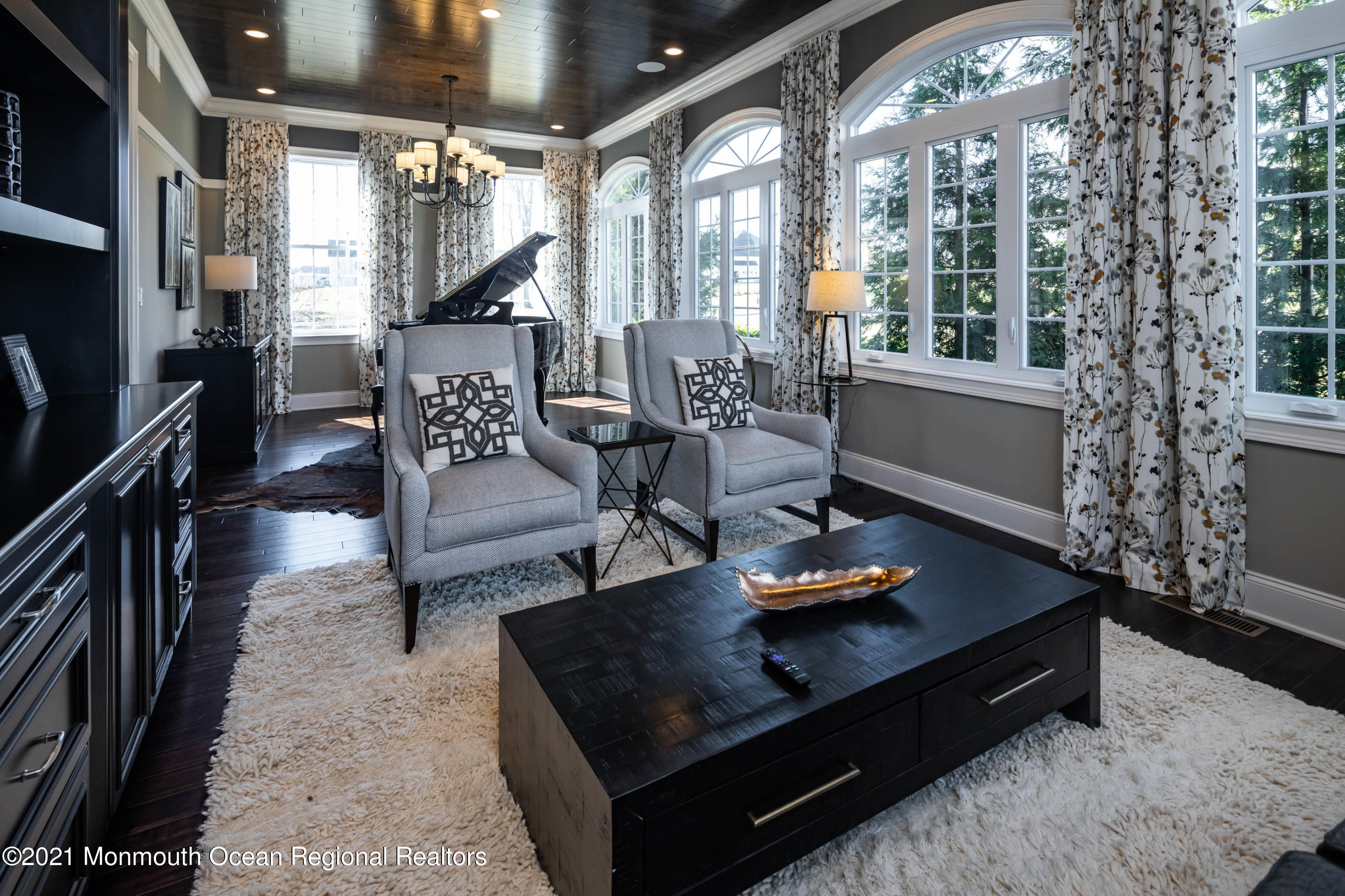 8 Strathmore Road Lincroft, NJ 07738 - Photo 18 of 76 a living room with furniture and a potted plant