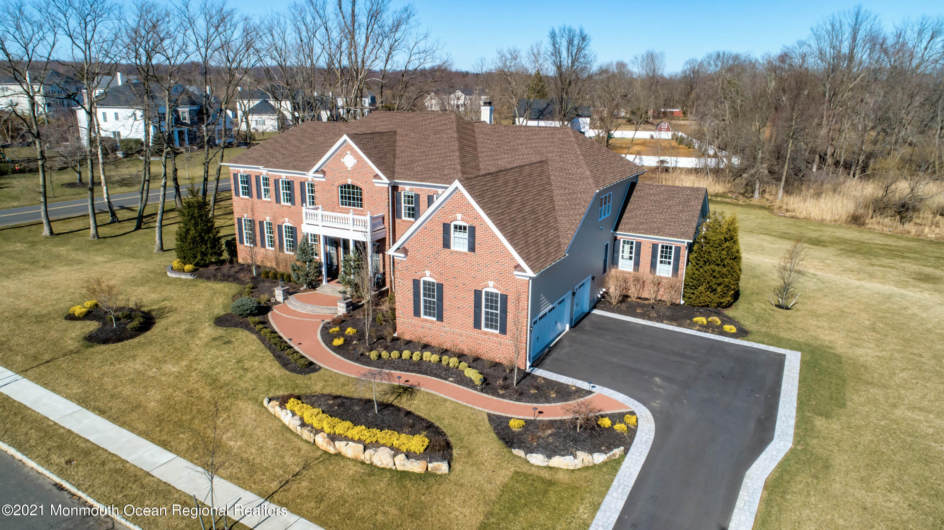 8 Strathmore Road Lincroft, NJ 07738 - Photo 3 of 76 an aerial view of a house with swimming pool and big yard