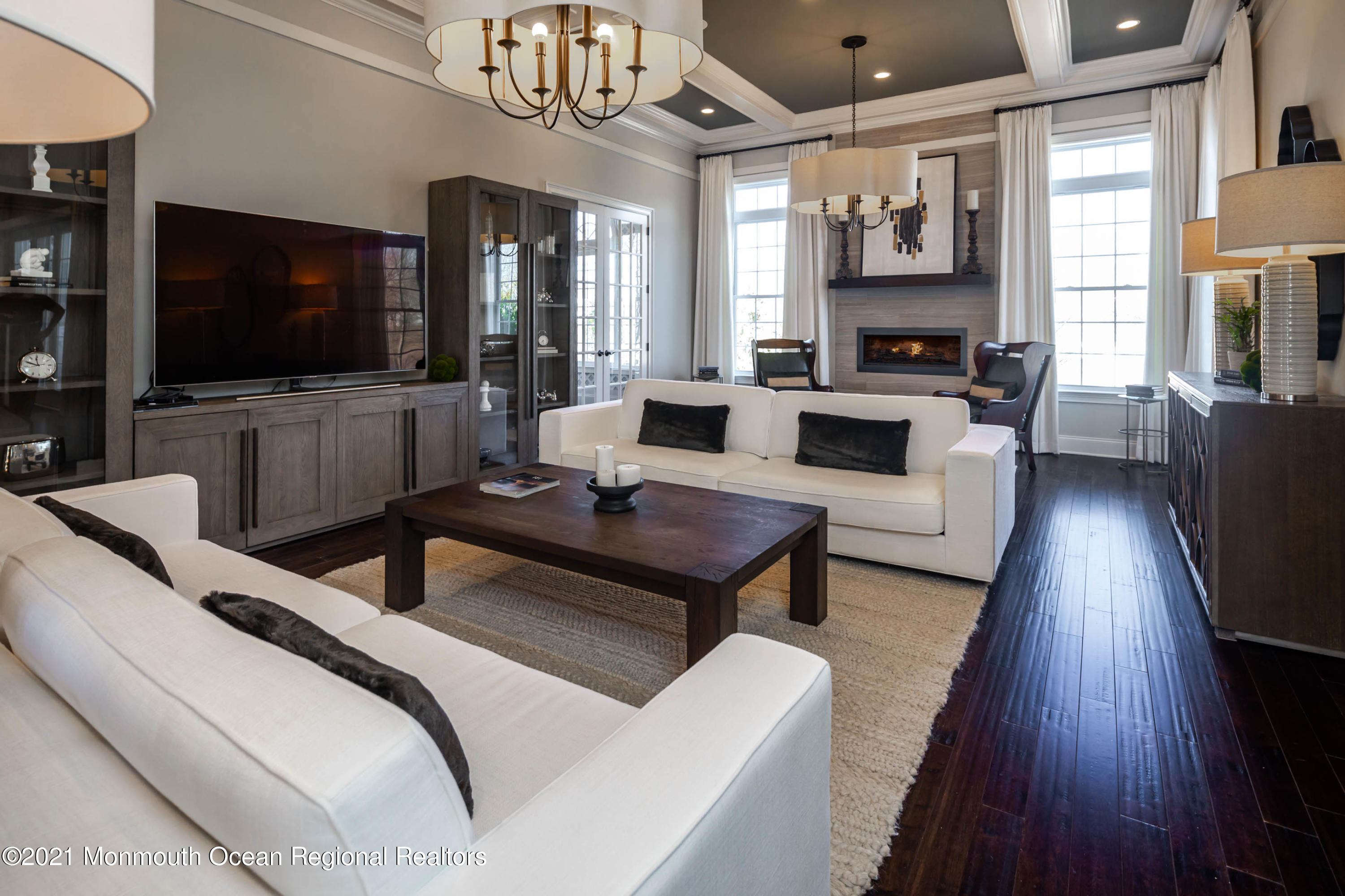 8 Strathmore Road Lincroft, NJ 07738 - Photo 22 of 76 a living room with furniture and a flat screen tv