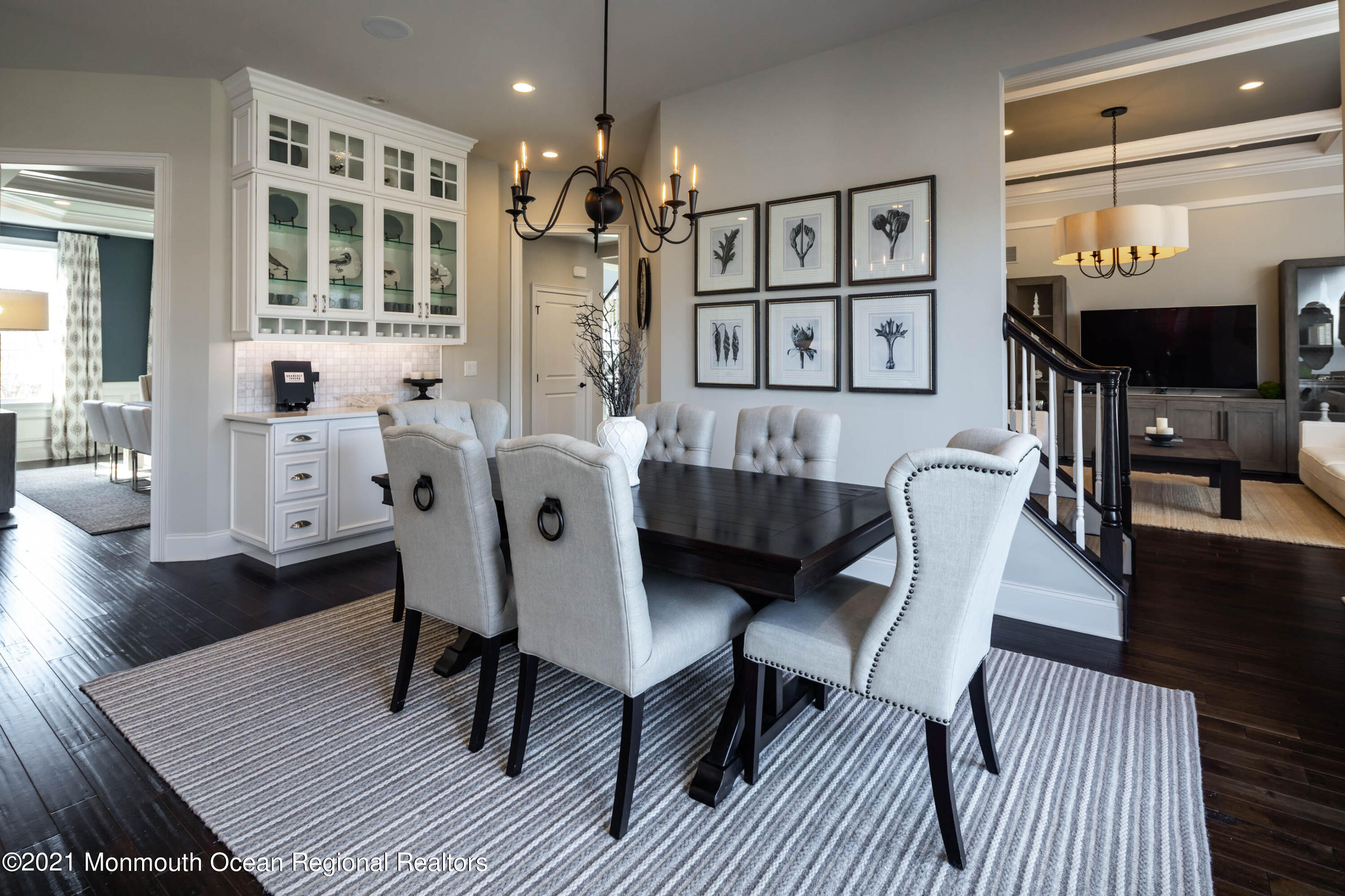 8 Strathmore Road Lincroft, NJ 07738 - Photo 32 of 76 a view of a dining room with furniture and wooden floor