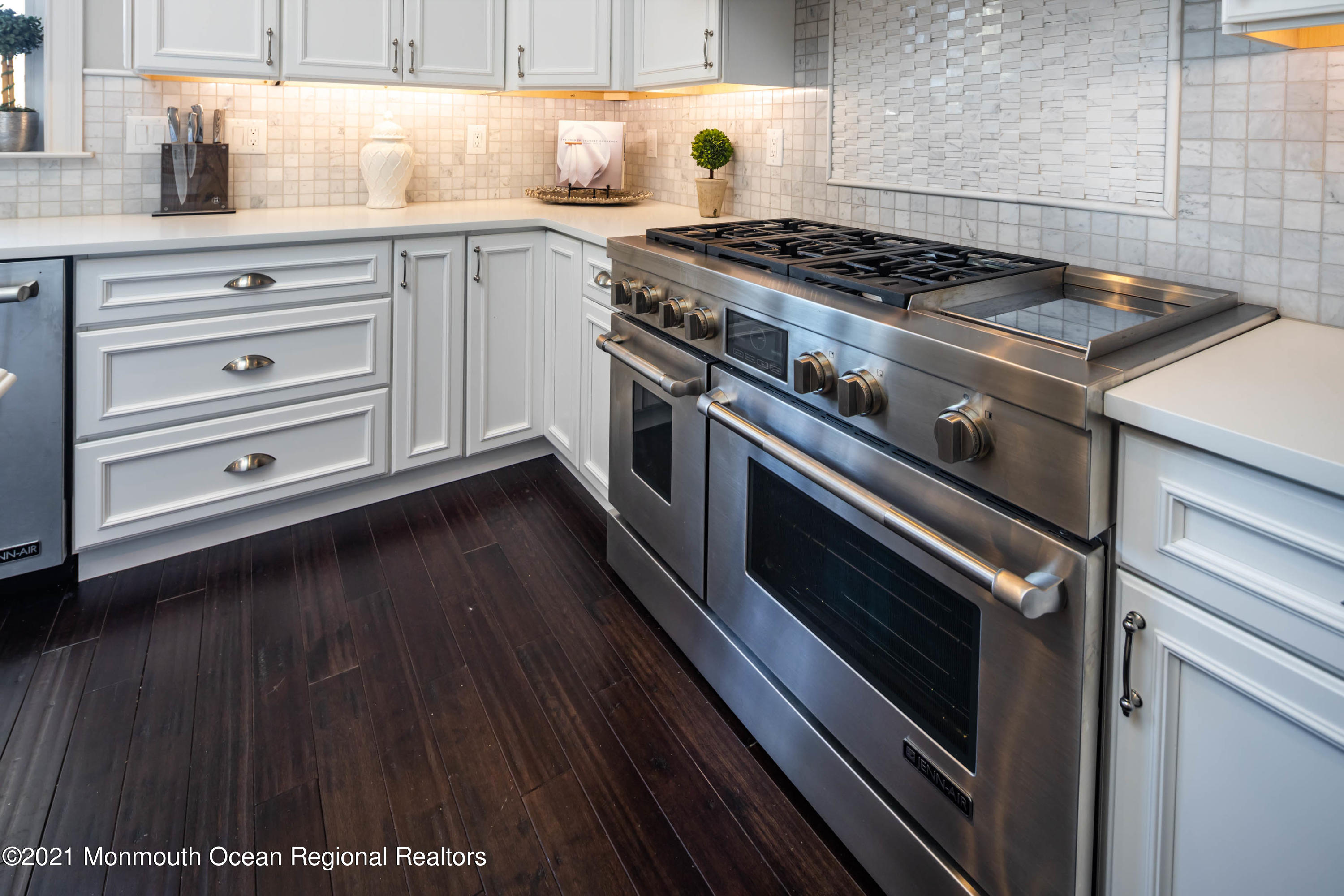 8 Strathmore Road Lincroft, NJ 07738 - Photo 34 of 76 a stove top oven sitting inside of a kitchen