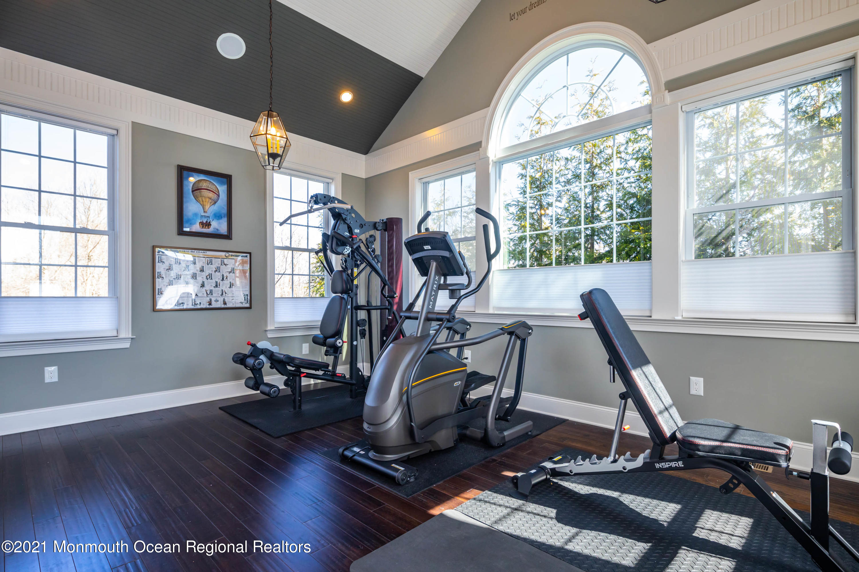 8 Strathmore Road Lincroft, NJ 07738 - Photo 36 of 76 a view of a room with gym equipment